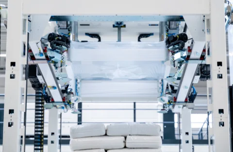 Stretch hood machines