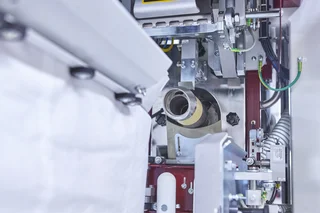 Packing machines for valve bags